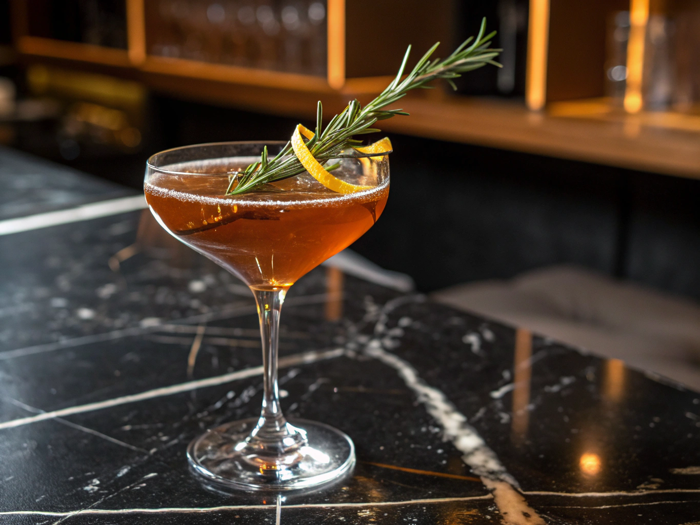 Handcrafted cocktail with smoked rosemary garnish