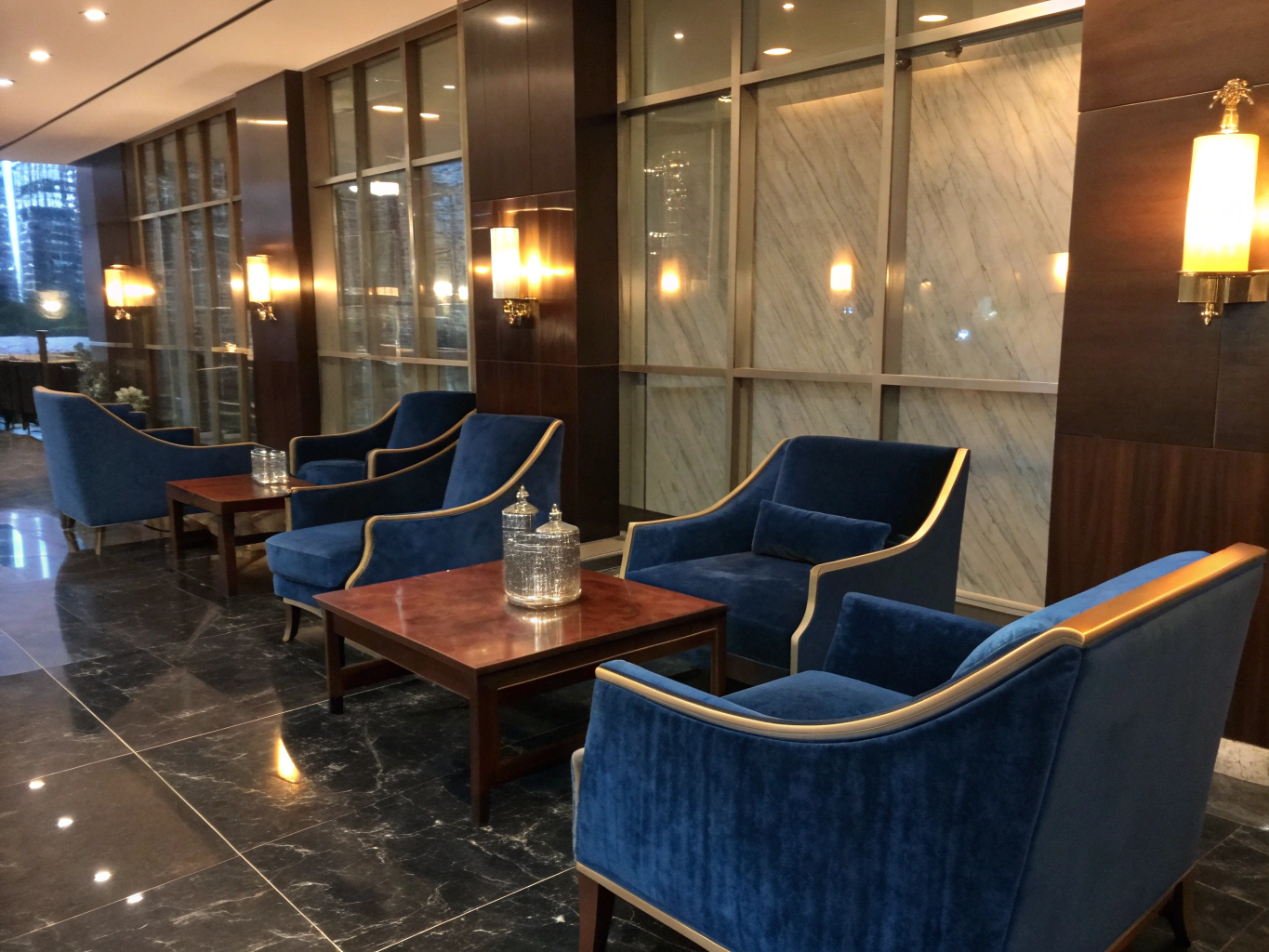 Atmospheric interior of A Libertines lounge with warm lighting and plush seating