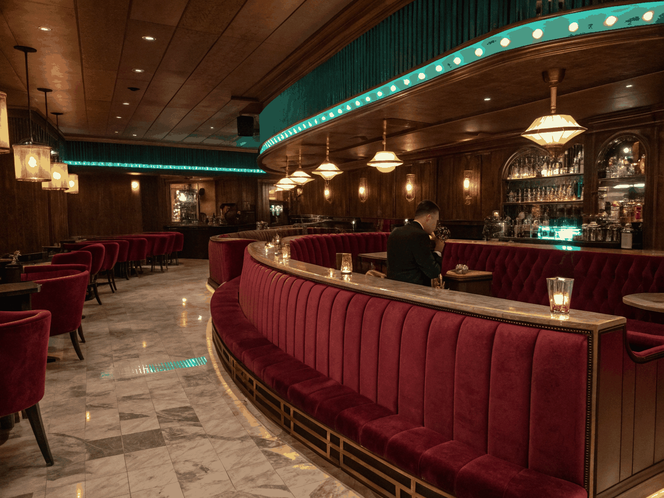 Intimate atmospheric lounge with warm ambient lighting and cocktail bar